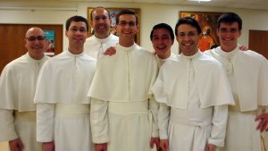 Students from St Michael's Abbey, Frater Pio Vottola, Frater Frederick Schmit, Frater Anselm Rodriguez, Frater Clement Hurtgen, Frater Julian Tsai, Frater Peregrine Fletcher, and Frater Peter Adrian Miller