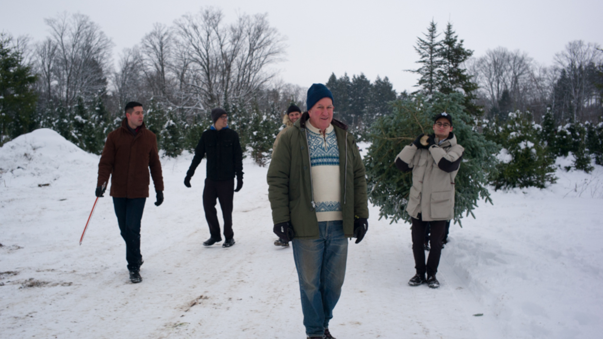 Fr Juvenal leads the novices in procuring a Christmas tree