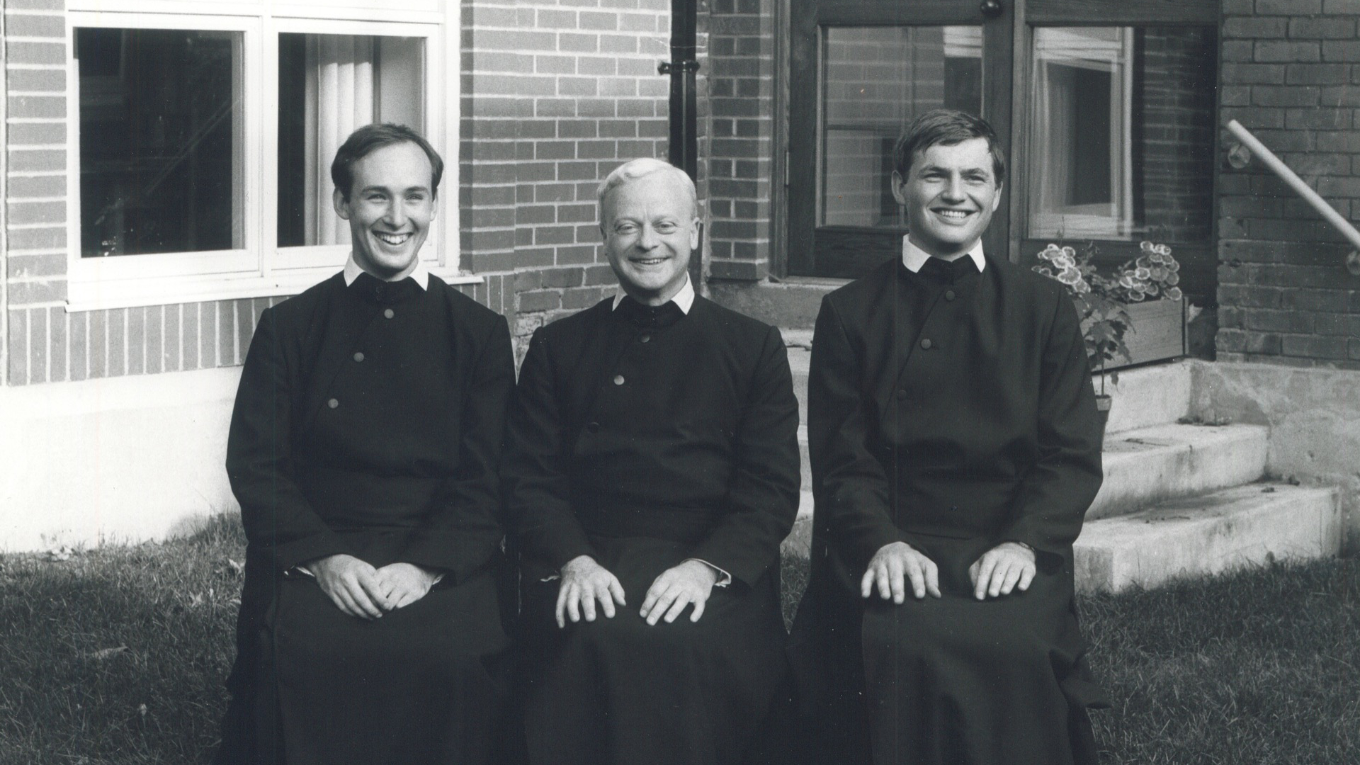 Fr Robinson seated between Fr Paul and Fr Martin, the new novices