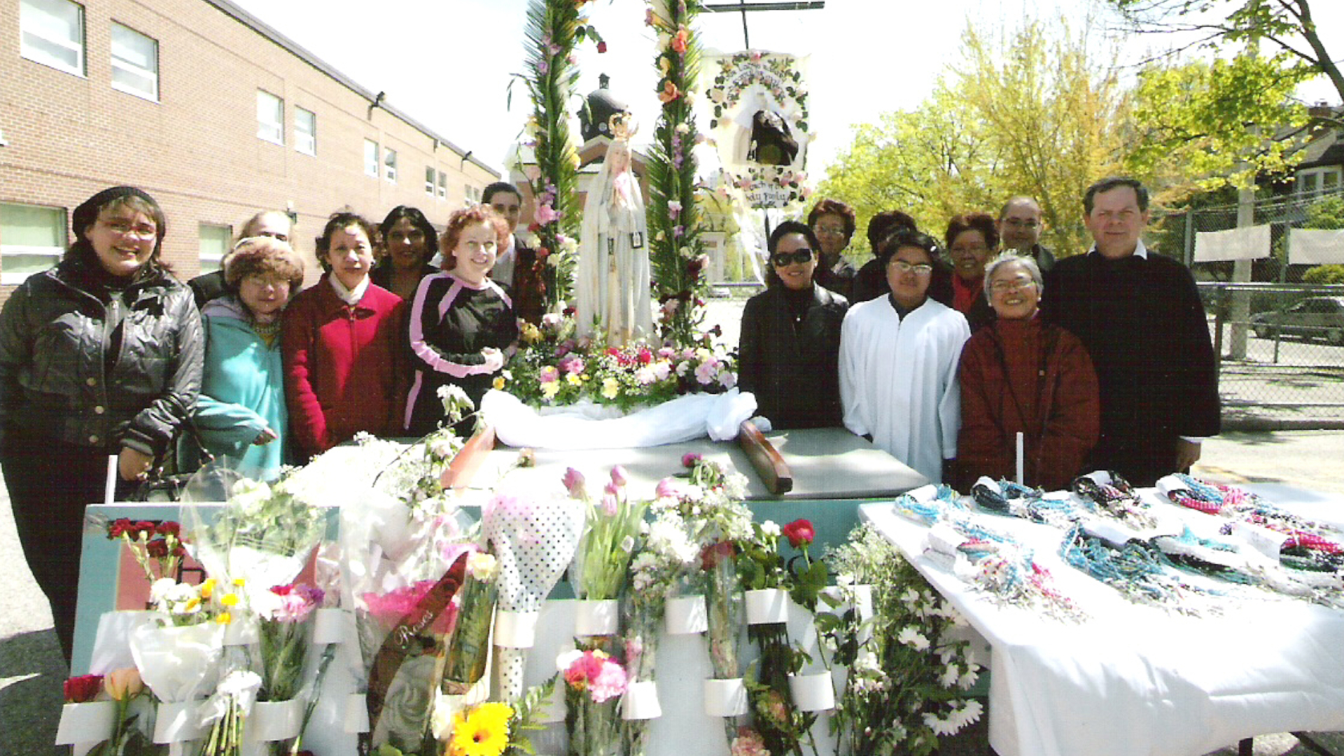 Flowers adorn our Lady after a procession
