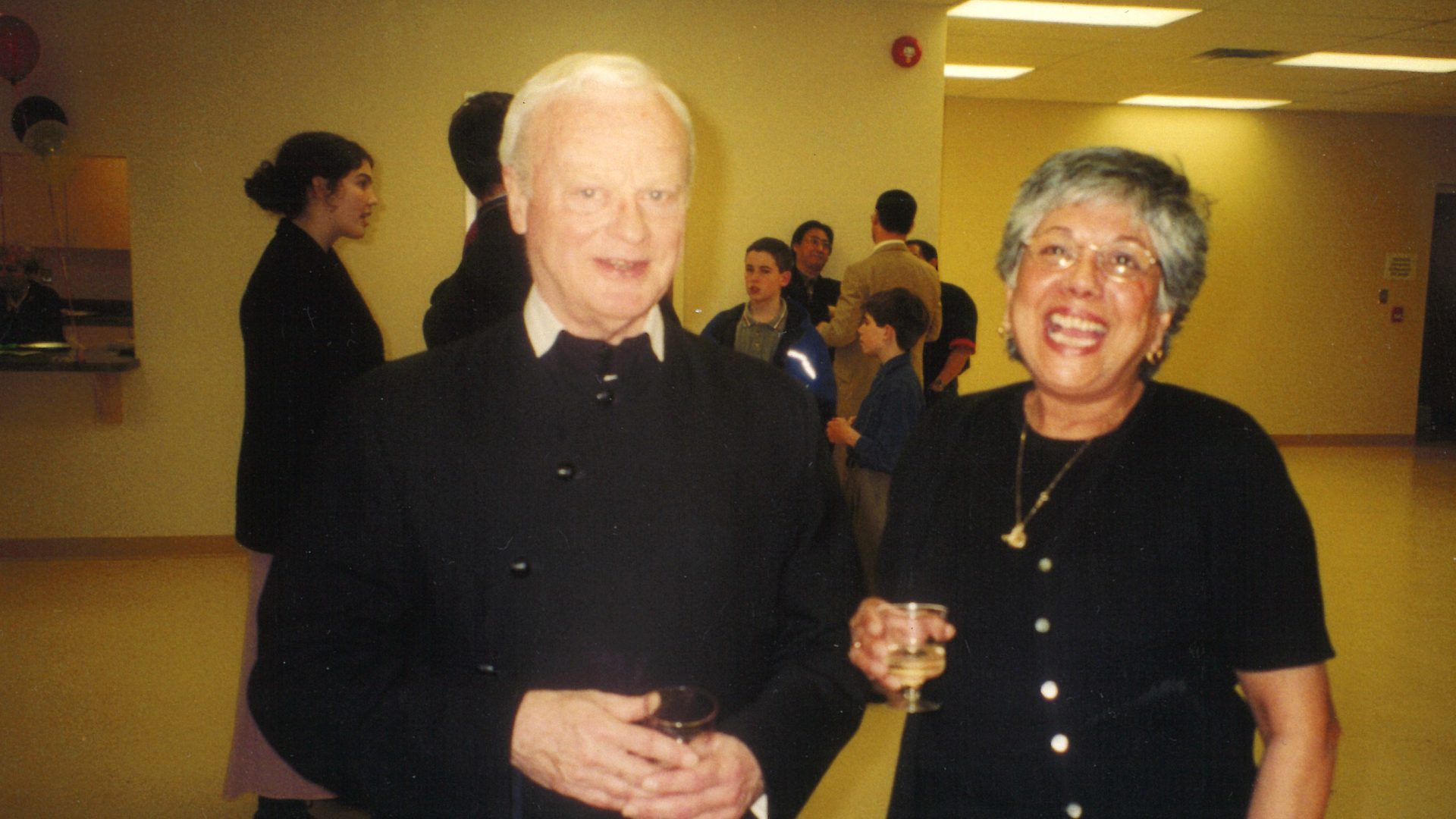 Fr Robinson with Jean D'Cruz at a reception