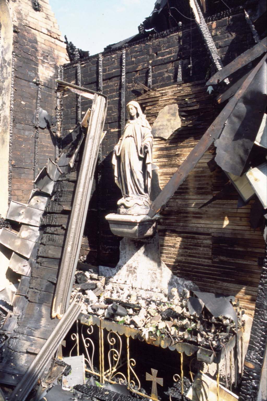 The Statue of Our Lady after the fire at Holy Family